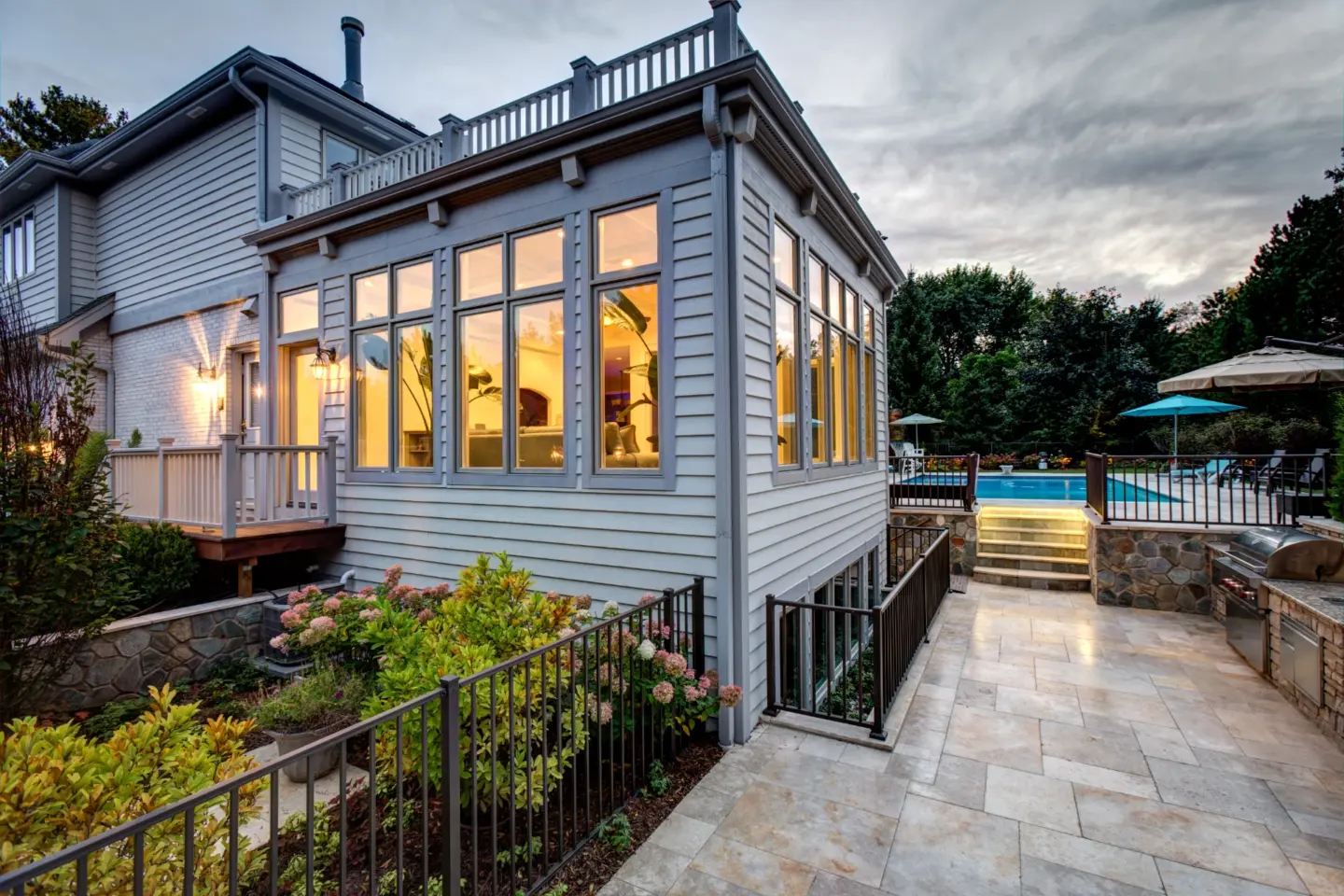 00 beautiful glowing sunroom next to pool