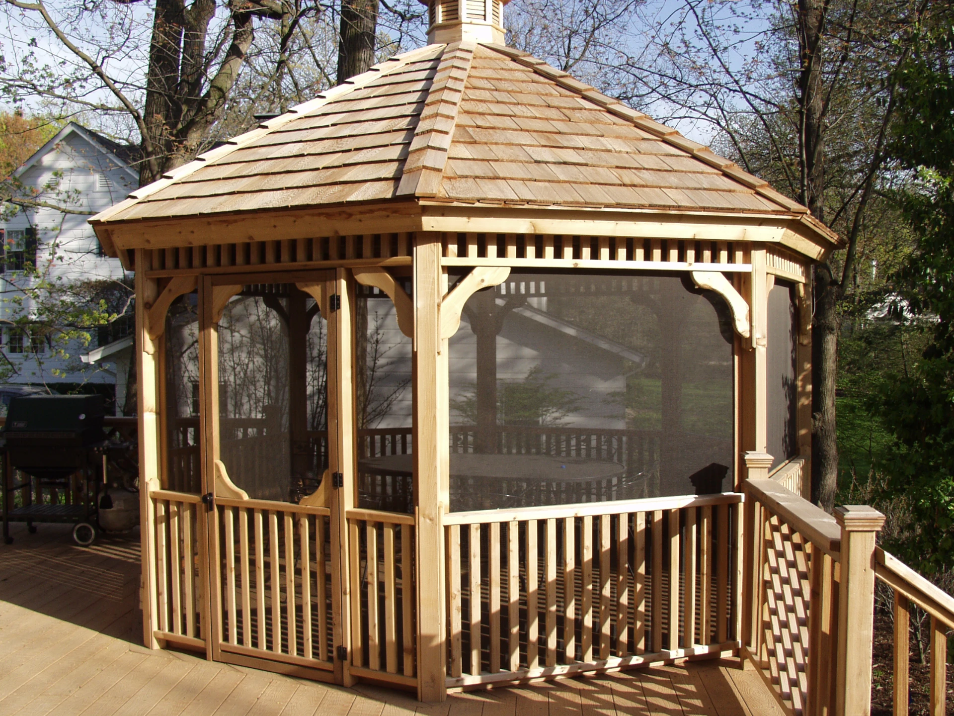 06 cedar gazebo with screen windows and cedar shakes