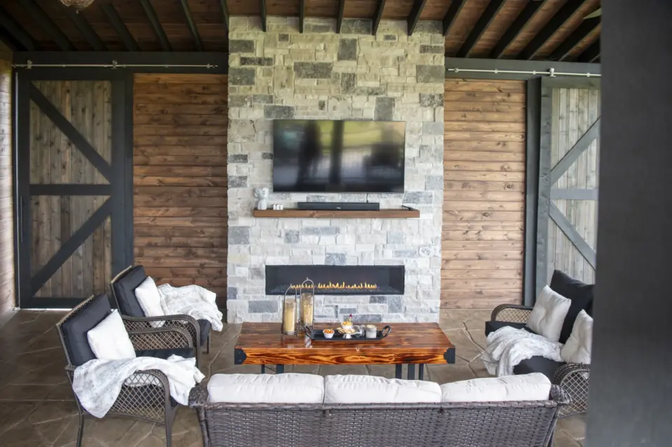 07 beautiful gable pavilion living space with fireplace and television