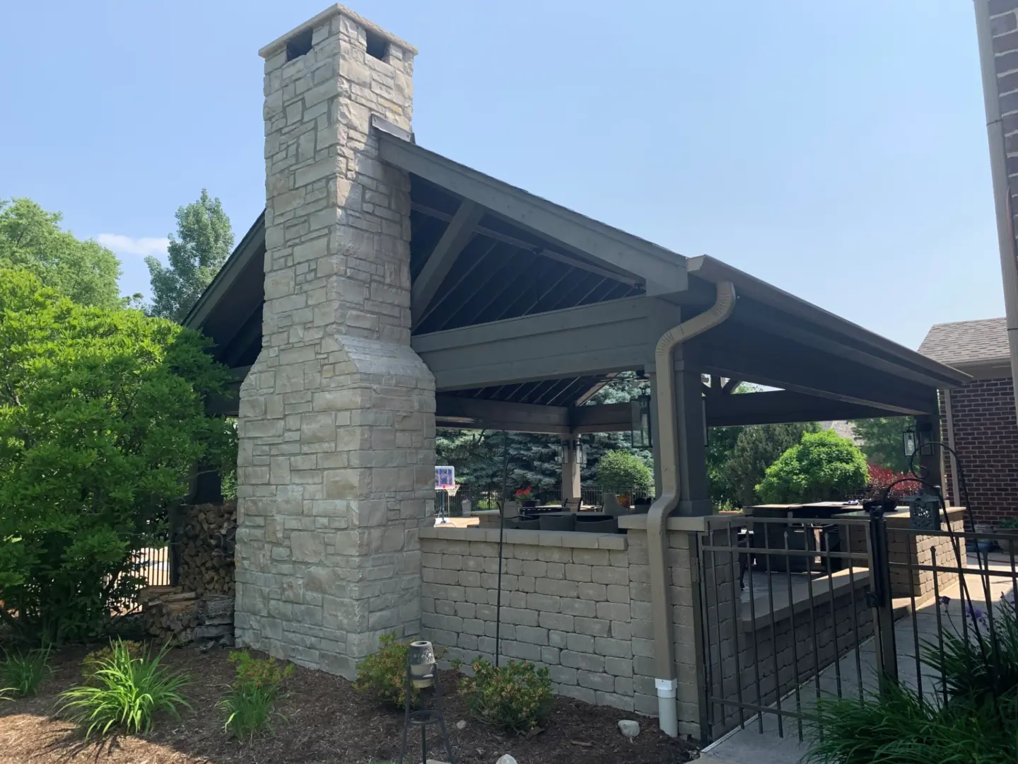 10 taupe gable pavilion with stone fireplace