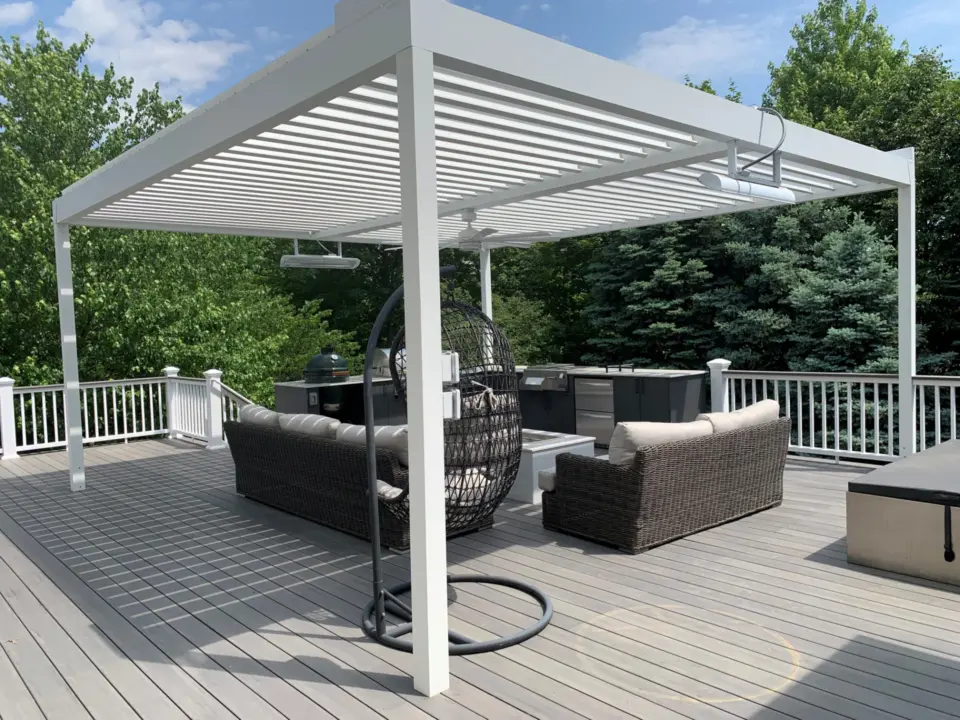 17 white aluminum Corradi Alba pergola above outdoor kitchen and TimberTech Castle Gate cellular pvc deck