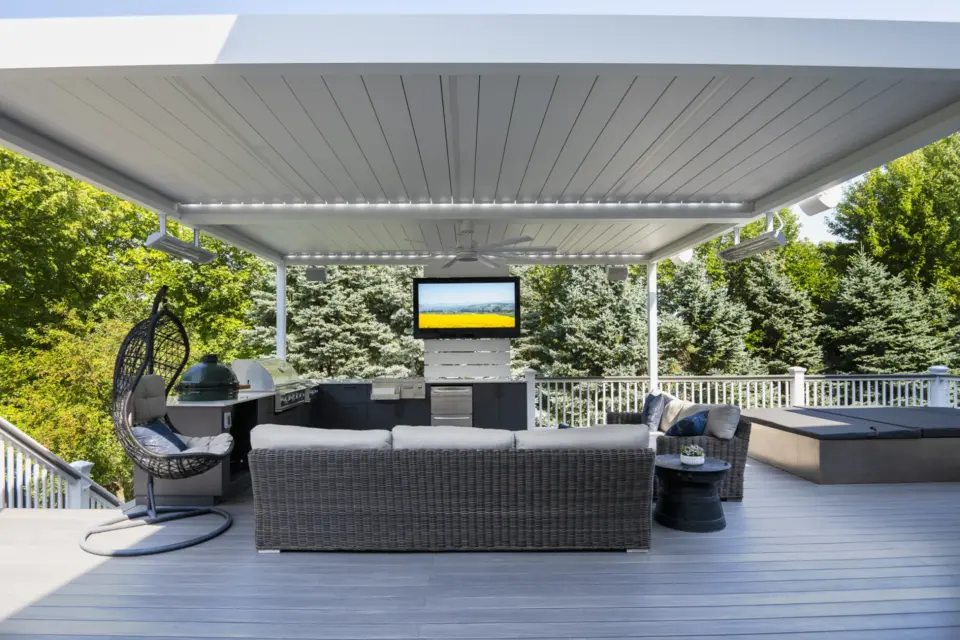 23 white aluminum Corradi Alba pergola above outdoor kitchen and TimberTech Castle Gate cellular pvc deck