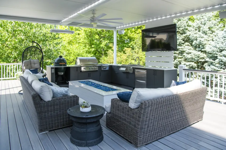 24 white aluminum pergola above outdoor kitchen and gray pvc deck
