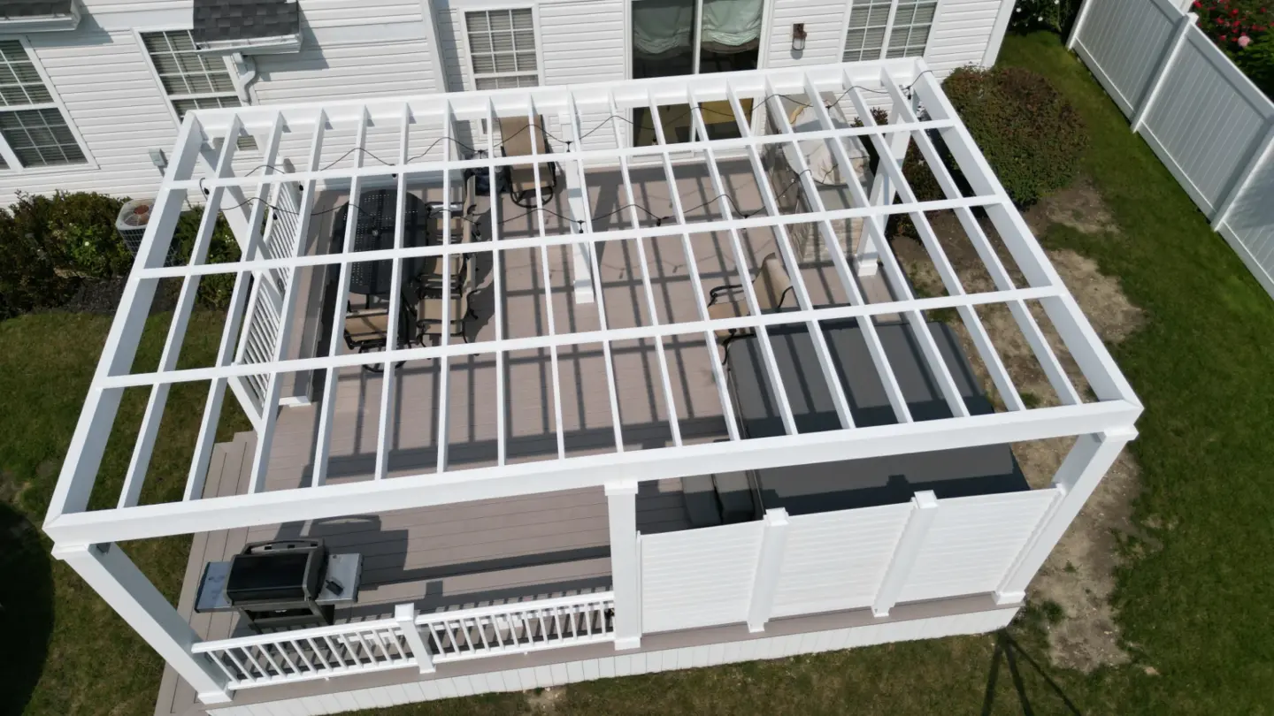 32 custom white cellular pvc pergola above pvc deck