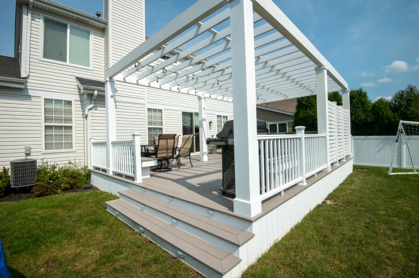 34 custom white cellular pvc pergola above pvc deck